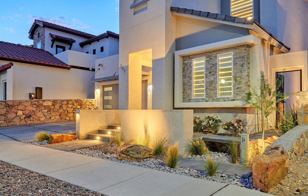 Design ideas for a small drought-tolerant backyard concrete paver garden path.
