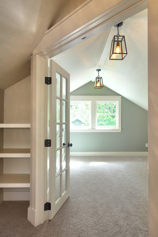 Photo of a small traditional master bedroom in Boise with grey walls and carpet.