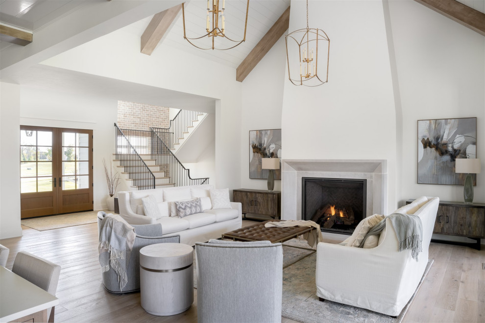 Inspiration for a medium sized traditional formal enclosed living room in Indianapolis with white walls, a concrete fireplace surround, no tv, light hardwood flooring, a standard fireplace, beige floors, exposed beams, a timber clad ceiling and a vaulted ceiling.