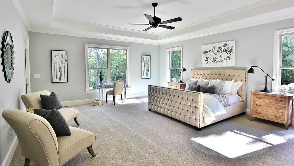 This is an example of a transitional bedroom in Atlanta with grey walls, carpet and grey floor.