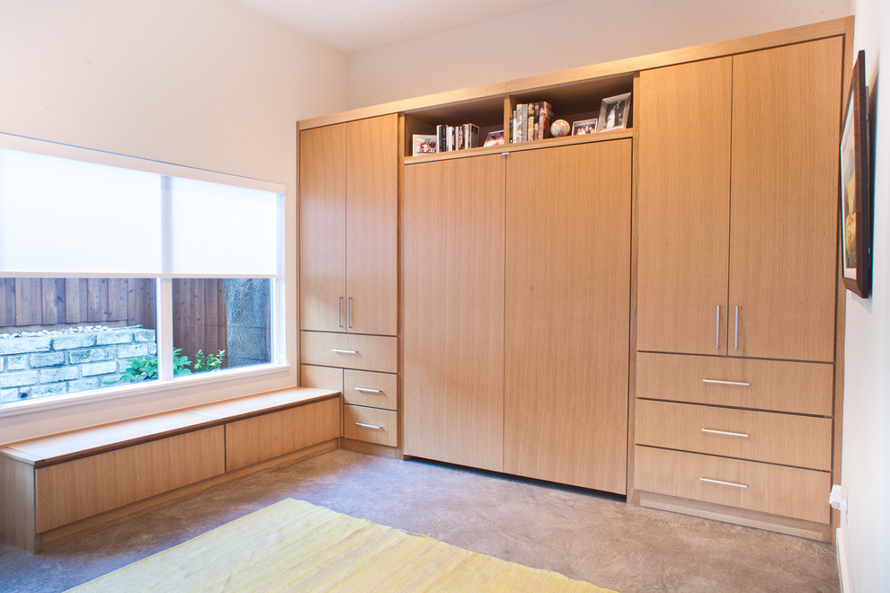 Example of a large transitional carpeted and beige floor bedroom design in Dallas with white walls and no fireplace