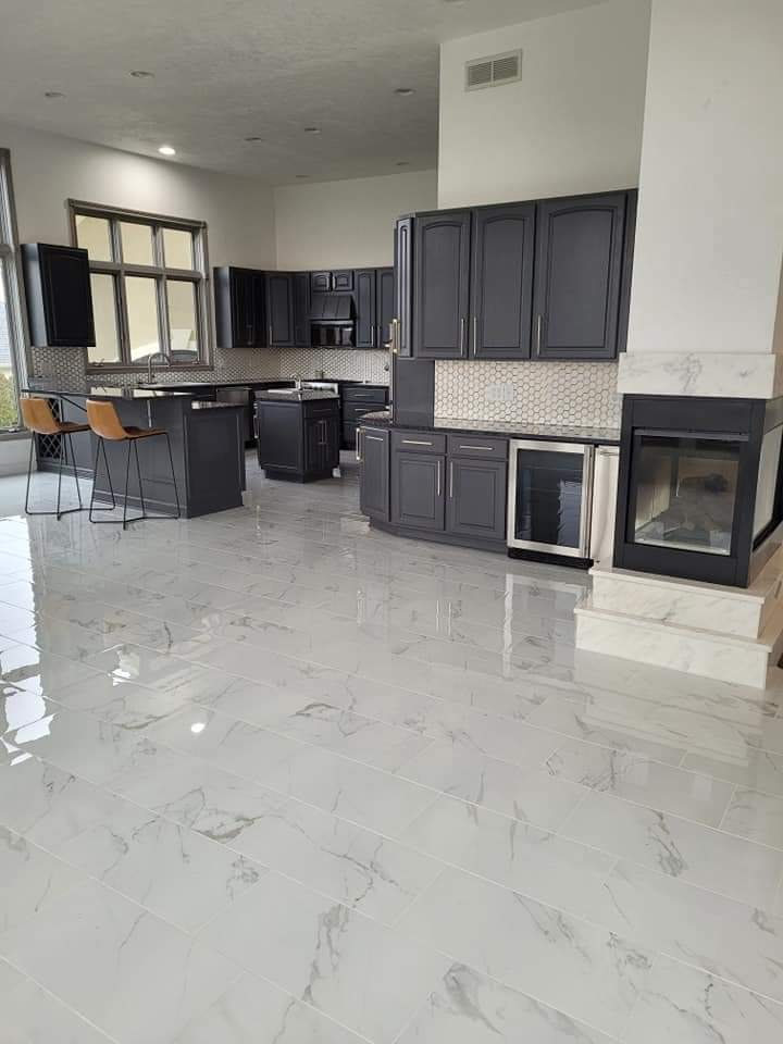 Large elegant ceramic tile and white floor kitchen photo in Indianapolis with a drop-in sink, white backsplash, ceramic backsplash and an island
