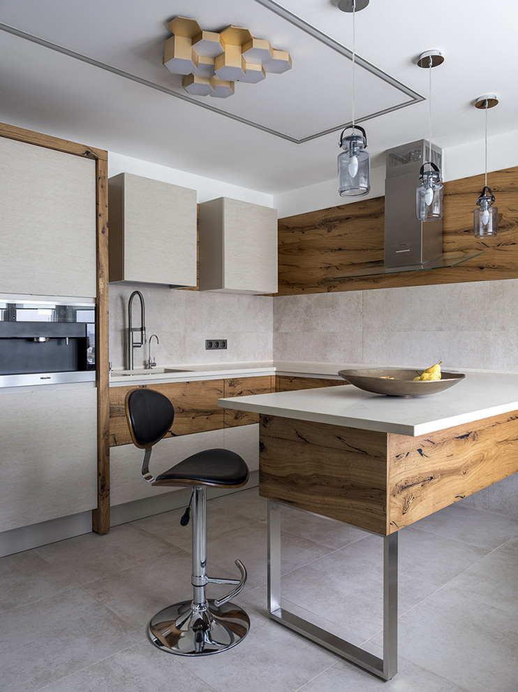Photo of a contemporary u-shaped kitchen in Moscow with flat-panel cabinets, beige splashback and a peninsula.