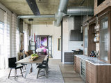 Industrial Dining Room by Avant Garde Wood Floors