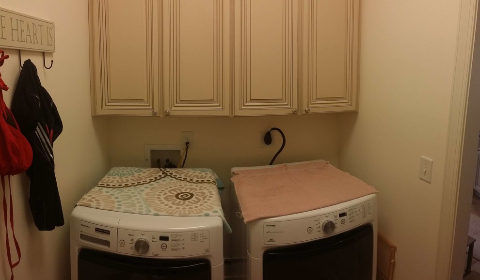 Photo of a beach style laundry room in Other.