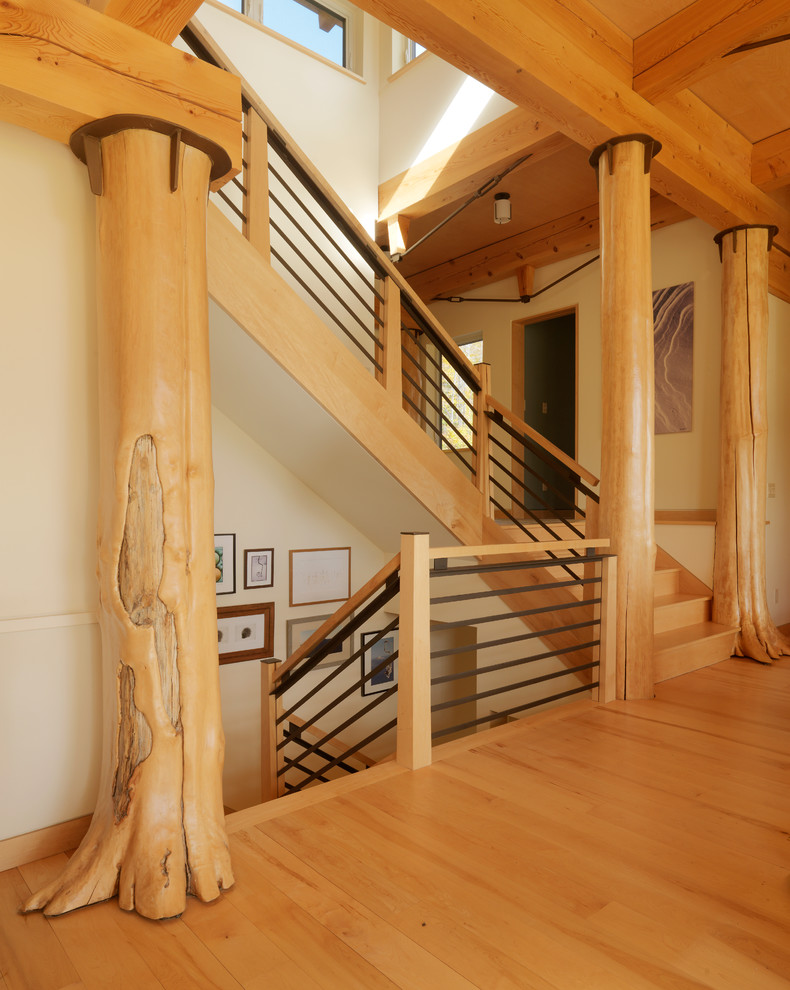 Photo of a country wood l-shaped staircase in Burlington with wood risers.