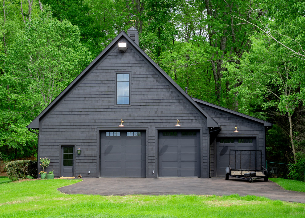 Design ideas for a large country detached three-car garage in Other.