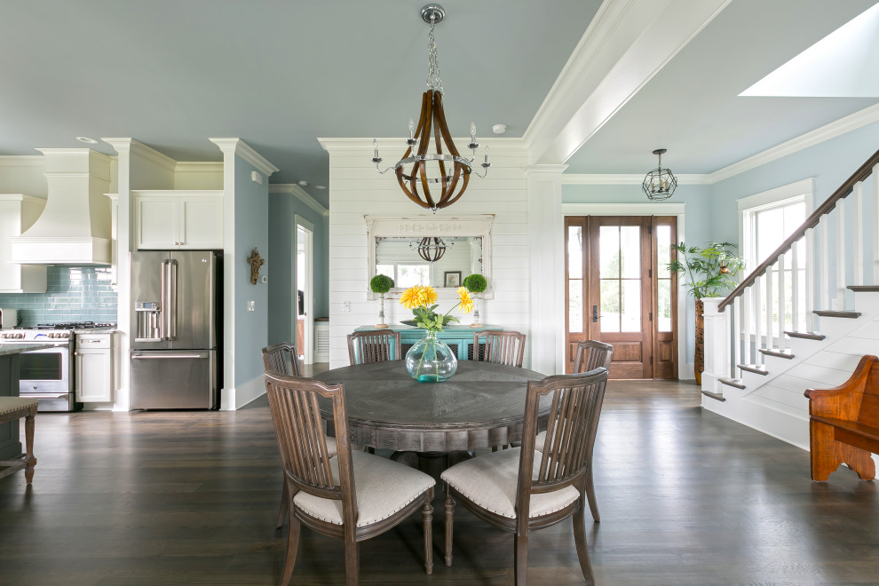 Inspiration for a large beach style dining room in Tampa.