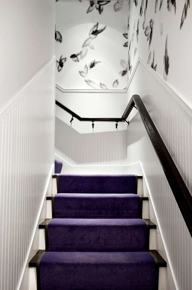 Inspiration for a transitional l-shaped staircase in New York.