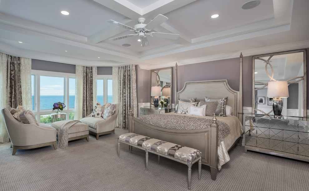 Photo of a large transitional master bedroom in Tampa with purple walls, carpet and no fireplace.