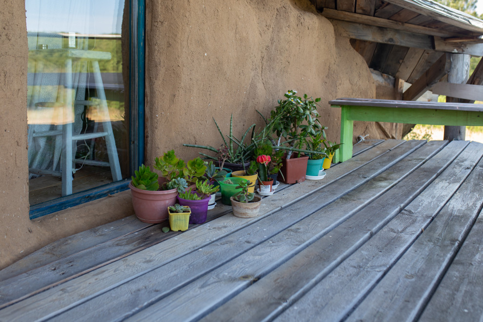 В гостях: Соломенный дом с русской печью