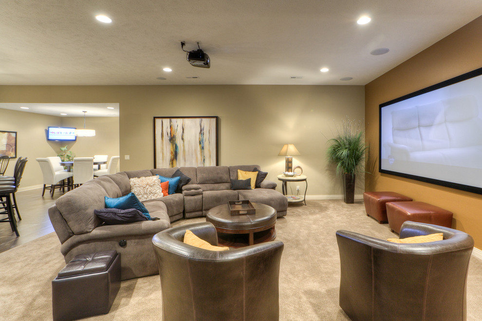 Inspiration for a traditional home theatre in Omaha with a projector screen.