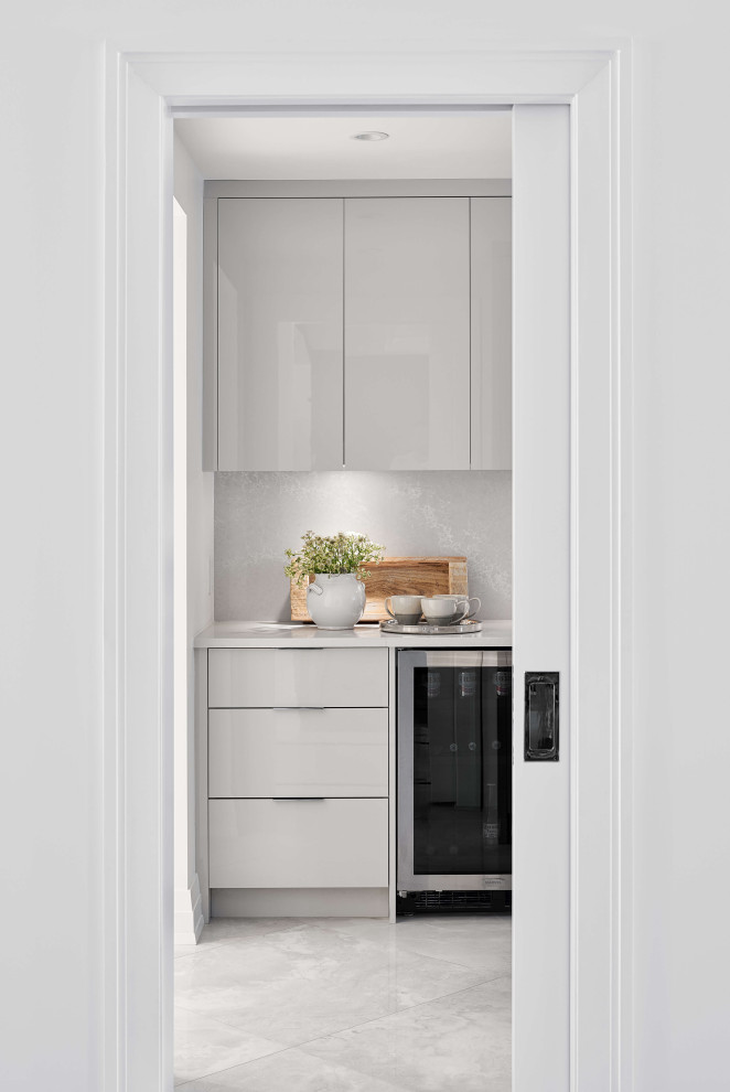 Eat-in kitchen - large contemporary l-shaped eat-in kitchen idea in Ottawa with two islands