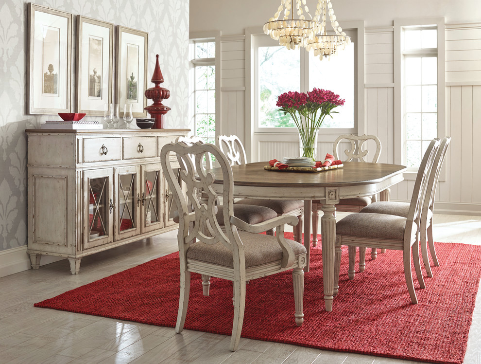 Inspiration for a mid-sized traditional separate dining room in Detroit with white walls and light hardwood floors.