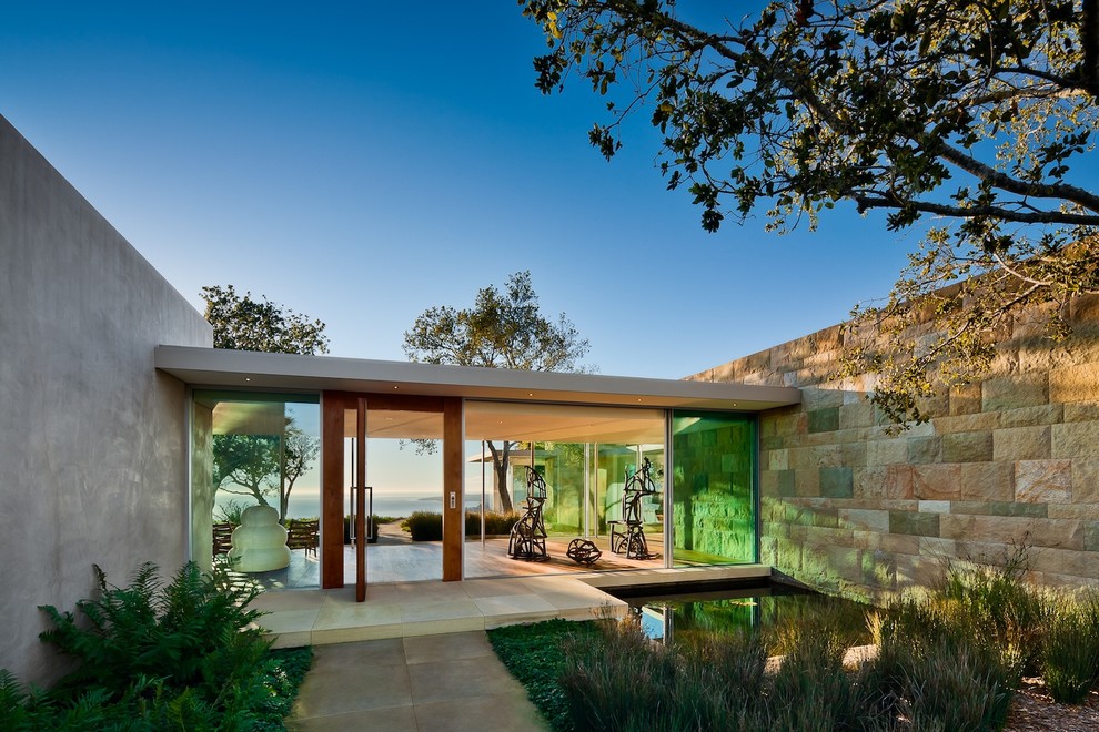This is an example of a modern exterior in Santa Barbara with stone veneer.