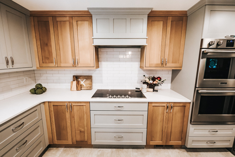 Example of a transitional kitchen design in Seattle