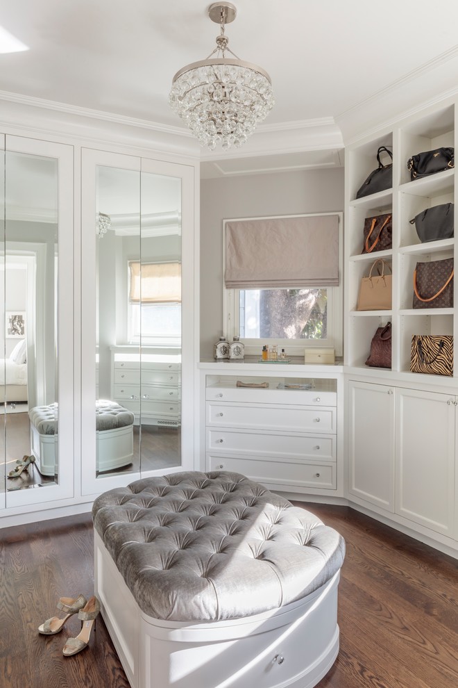 Design ideas for a transitional women's dressing room in San Francisco with white cabinets, dark hardwood floors, brown floor and recessed-panel cabinets.