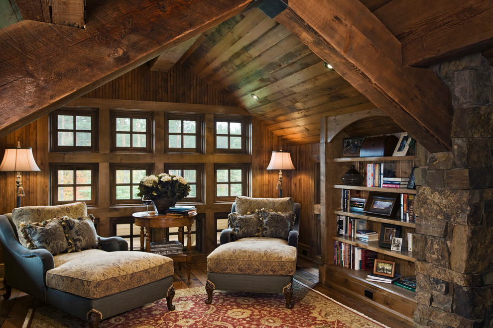Inspiration for a country family room in Other with brown walls, dark hardwood floors and no tv.