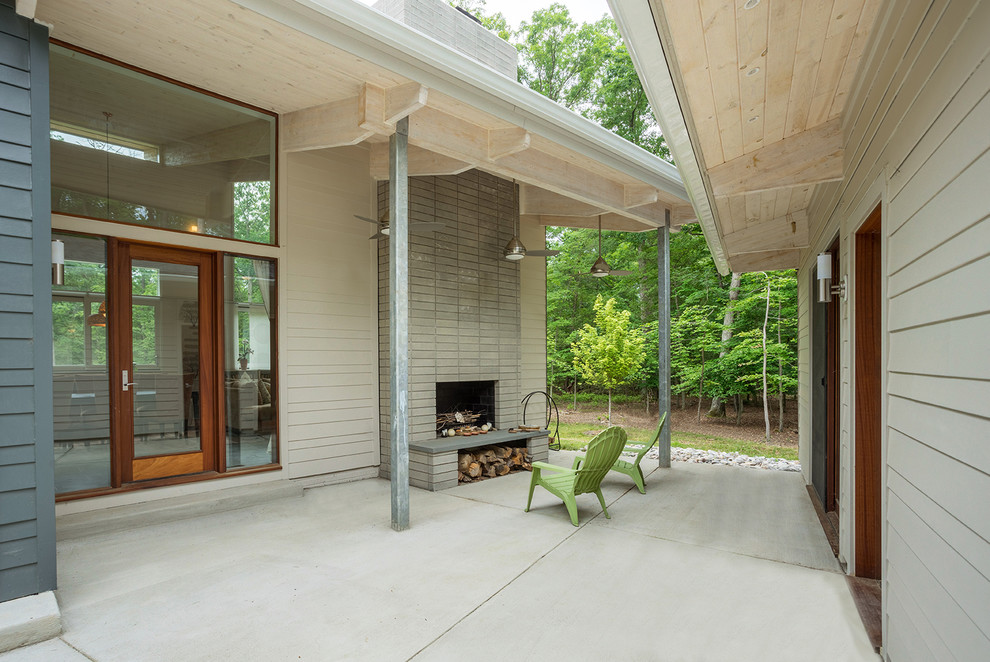 Inspiration for a small modern one-storey exterior in DC Metro with a shed roof.