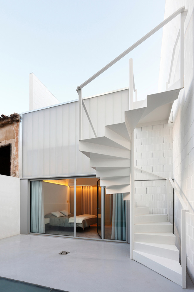 Mid-sized contemporary staircase in Other.