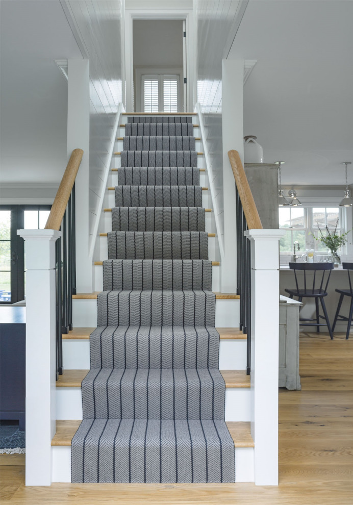 Example of a farmhouse staircase design in Burlington