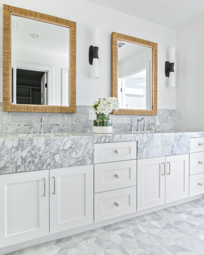 Design ideas for a mid-sized transitional master bathroom in Dallas with shaker cabinets, white cabinets, an alcove shower, a two-piece toilet, gray tile, marble, white walls, marble floors, an undermount sink, marble benchtops, grey floor, a hinged shower door, white benchtops, a double vanity and a built-in vanity.