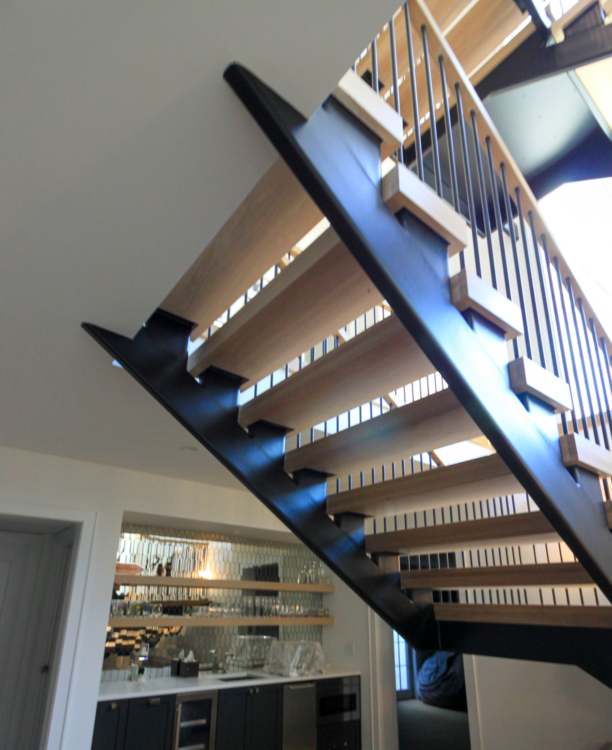 96_Dramatic cantilevered no-riser staircase, Bethesda, MD 20814