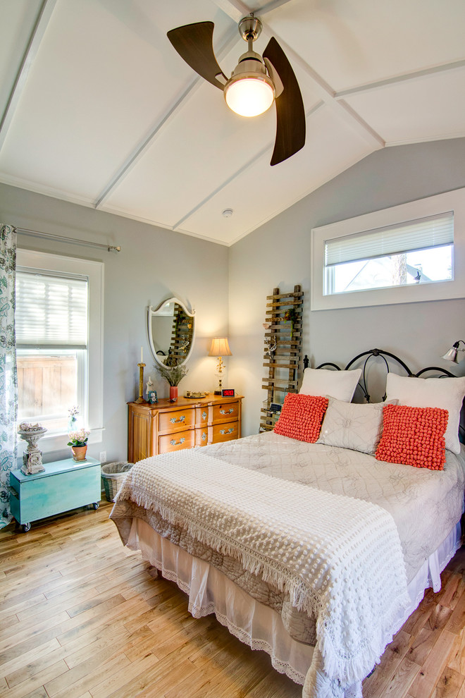Traditional bedroom in Jacksonville with medium hardwood floors.