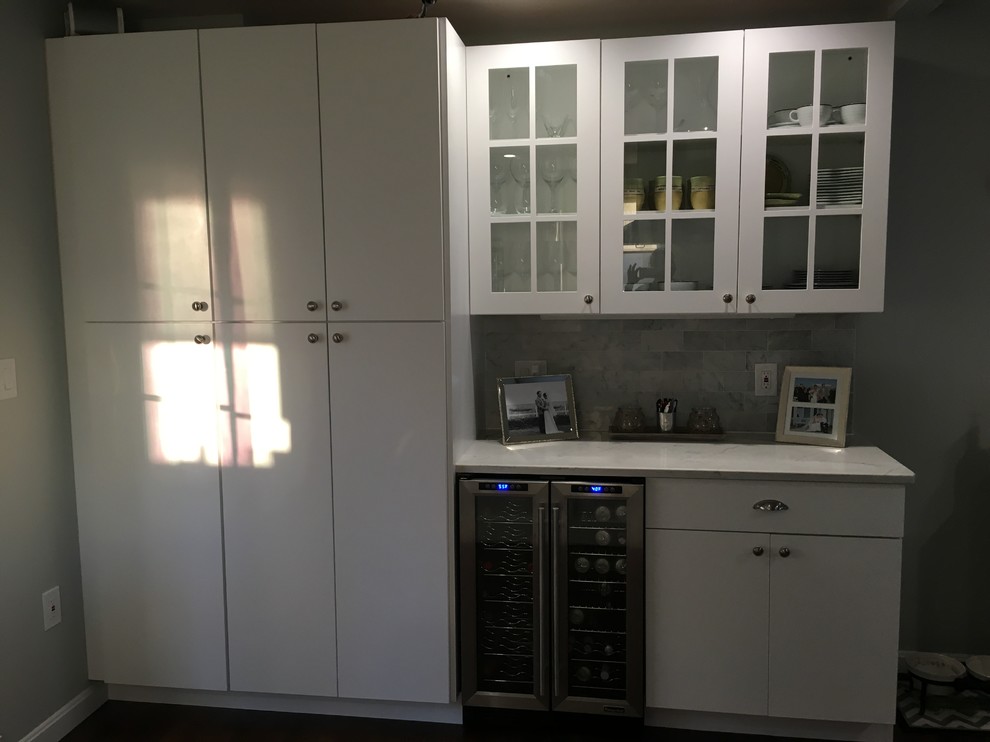 Example of a small transitional home design design in Boston