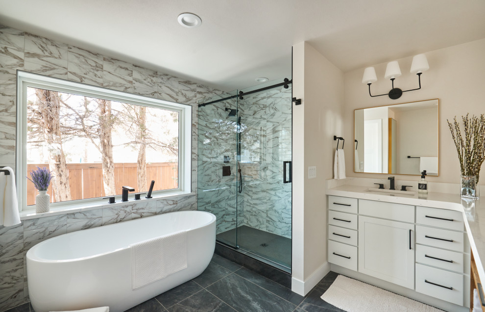 Bathroom - mid-sized contemporary master brown tile and ceramic tile ceramic tile, black floor and double-sink bathroom idea in Denver with shaker cabinets, white cabinets, a two-piece toilet, beige walls, an undermount sink, quartz countertops, white countertops and a built-in vanity
