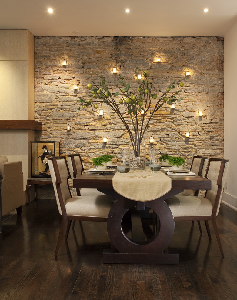 Design ideas for a contemporary dining room in Minneapolis with beige walls, dark hardwood floors and brown floor.