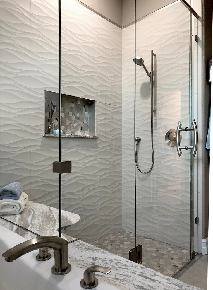 Photo of a mid-sized beach style master bathroom in Seattle with shaker cabinets, white cabinets, an alcove tub, a curbless shower, a two-piece toilet, beige tile, porcelain tile, porcelain floors, an undermount sink, engineered quartz benchtops, beige floor, a hinged shower door, black walls and black benchtops.