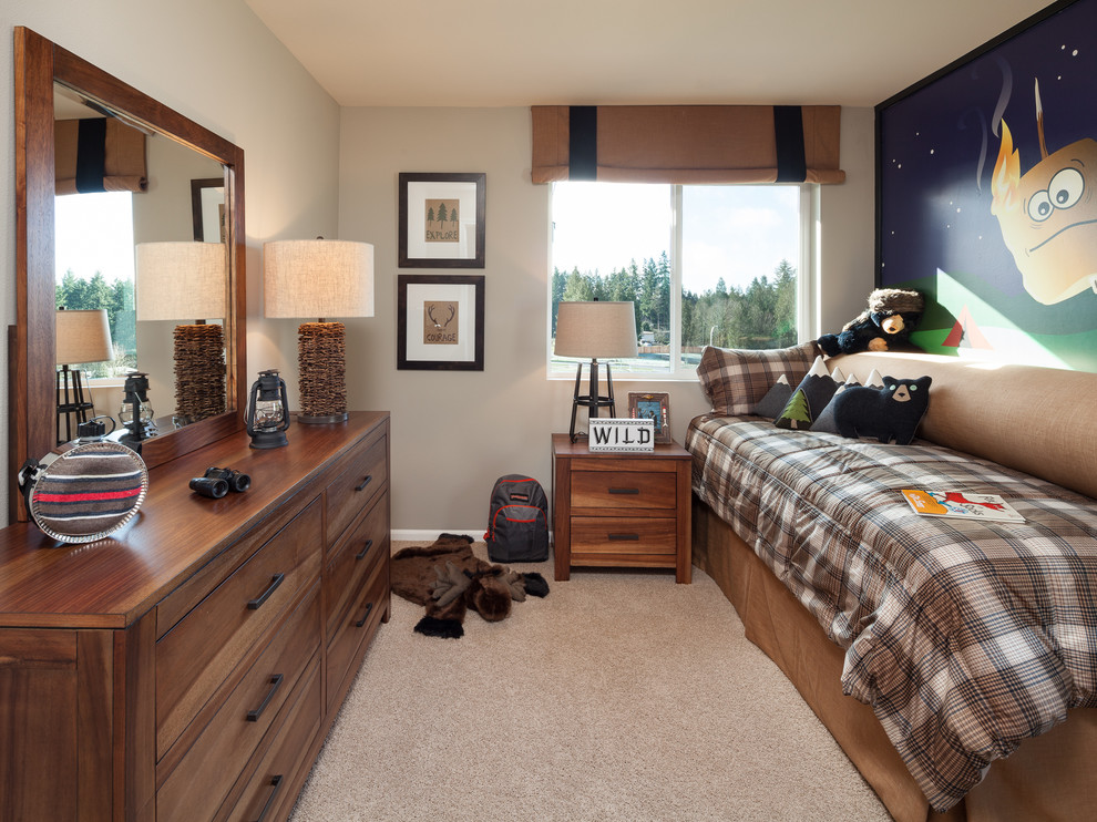 Photo of a traditional kids' bedroom for kids 4-10 years old and boys in Seattle with beige walls and carpet.