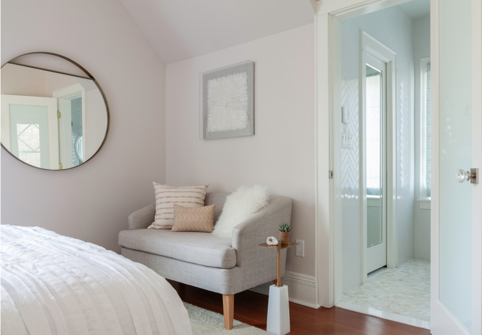 Photo of a rural bedroom in New York with grey walls, dark hardwood flooring and brown floors.