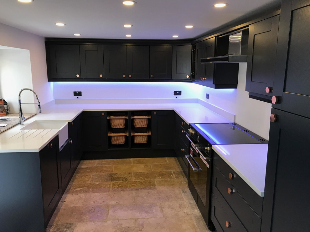 Design ideas for a transitional kitchen in Manchester.