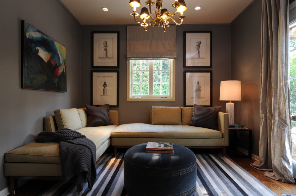 Inspiration for a transitional family room in New Orleans with grey walls.