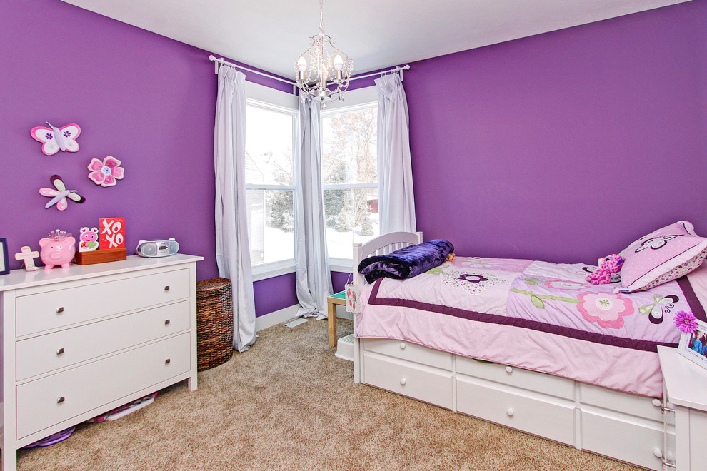 Inspiration for a mid-sized arts and crafts bedroom in Grand Rapids with purple walls, carpet and brown floor.