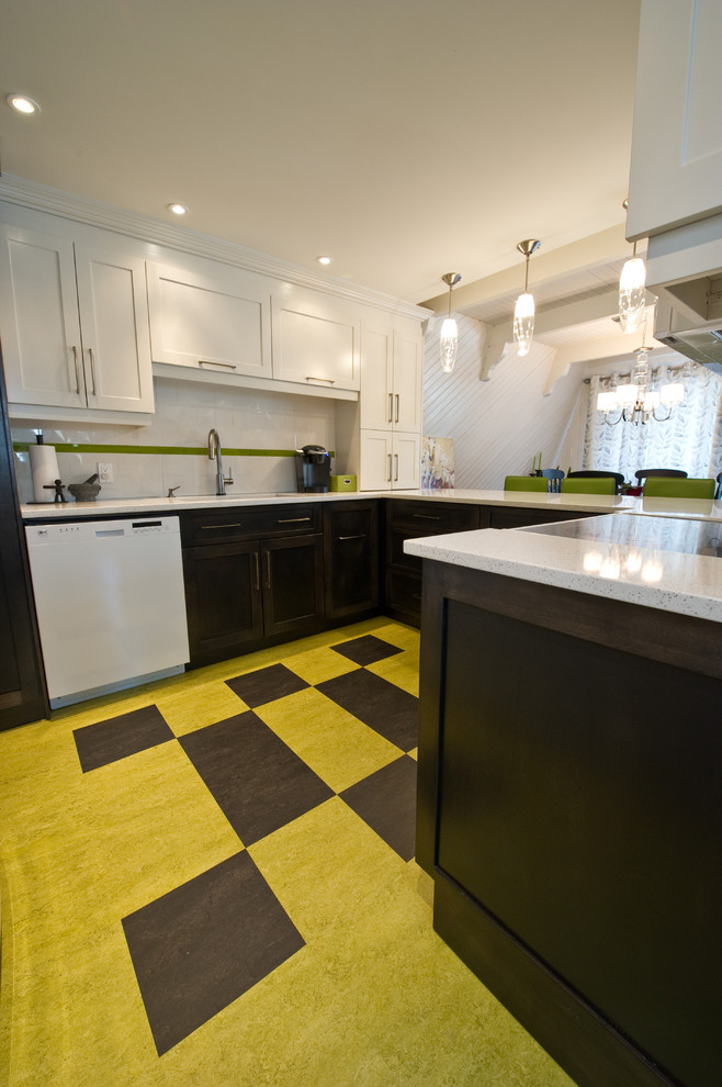 Photo of a mid-sized contemporary u-shaped eat-in kitchen in Montreal with an undermount sink, shaker cabinets, yellow cabinets, quartzite benchtops, porcelain splashback, white appliances, linoleum floors, with island and white splashback.