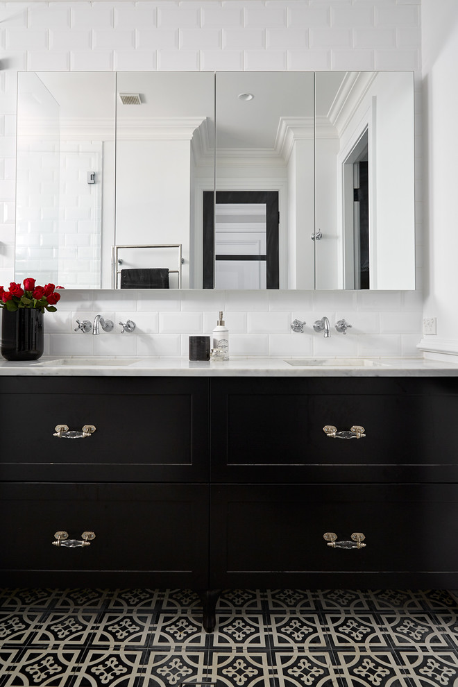 Inspiration for a large traditional master bathroom in Sydney with a freestanding tub, an open shower, a one-piece toilet, white tile, ceramic tile, white walls, ceramic floors, a drop-in sink, black floor, an open shower and shaker cabinets.