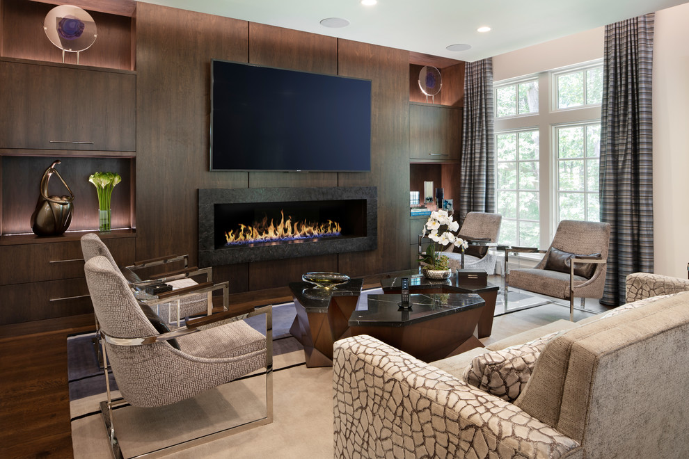 This is an example of a contemporary family room in DC Metro with a stone fireplace surround, a wall-mounted tv, white walls, dark hardwood floors, a ribbon fireplace and brown floor.