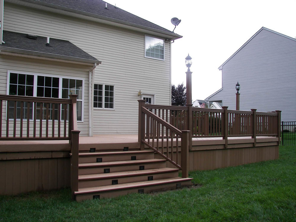 Deck - mid-sized transitional backyard deck idea