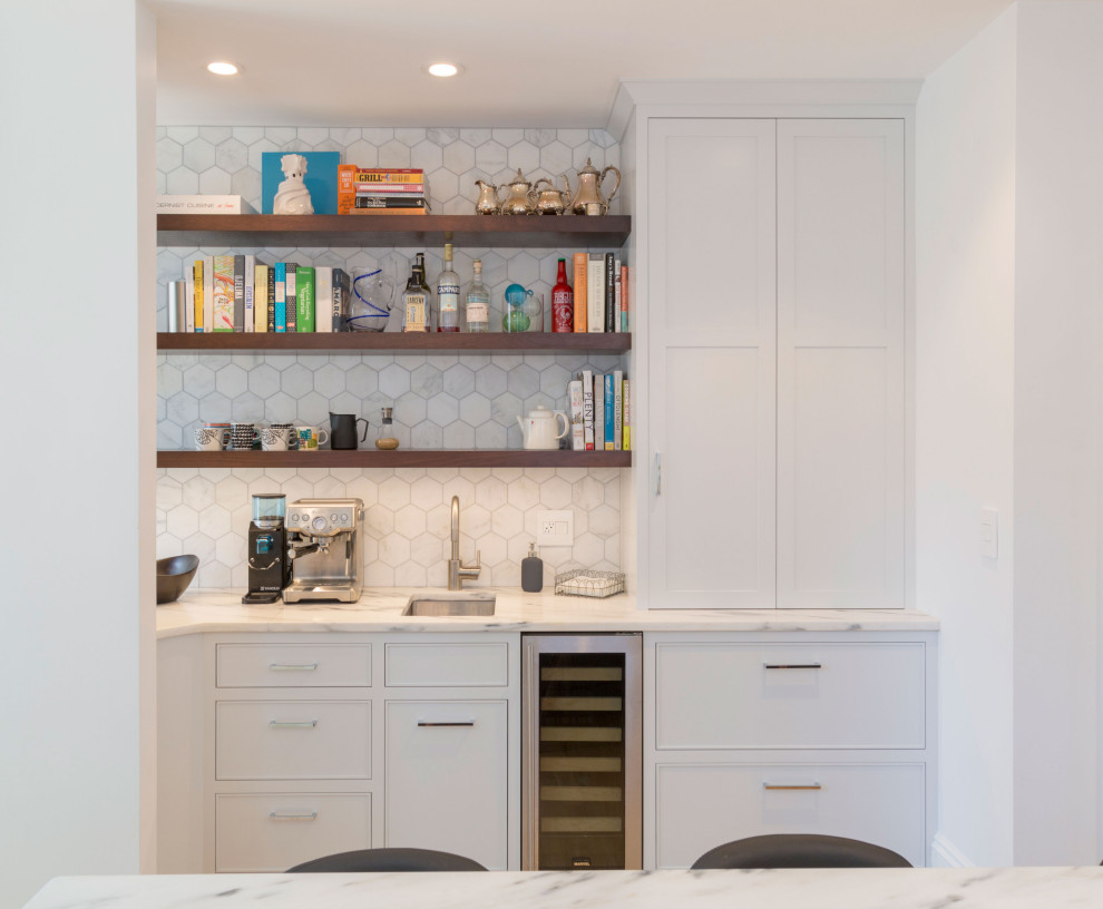 Inspiration for a mid-sized transitional kitchen remodel in Boston with beaded inset cabinets, white cabinets, marble countertops, gray backsplash, marble backsplash, stainless steel appliances and white countertops