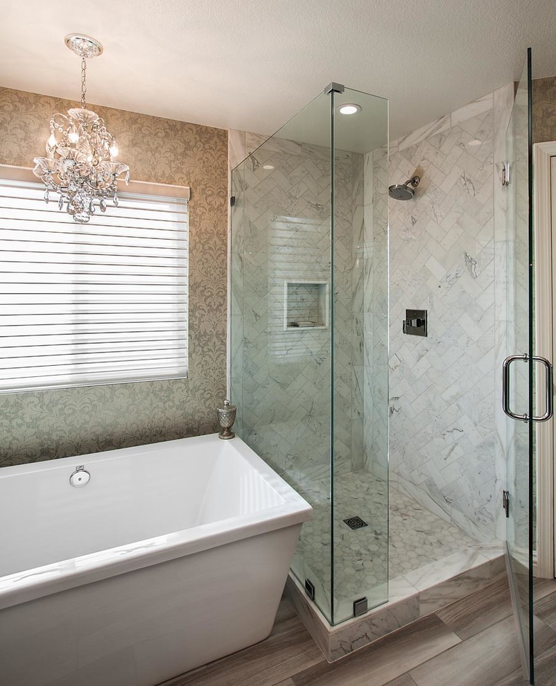 Freestanding bathtub - mid-sized transitional master white tile and stone tile porcelain tile freestanding bathtub idea in Orange County with an undermount sink, furniture-like cabinets, beige cabinets, quartz countertops, a two-piece toilet and beige walls