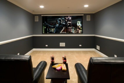 Example of a small classic enclosed carpeted home theater design in Chicago with gray walls and a projector screen