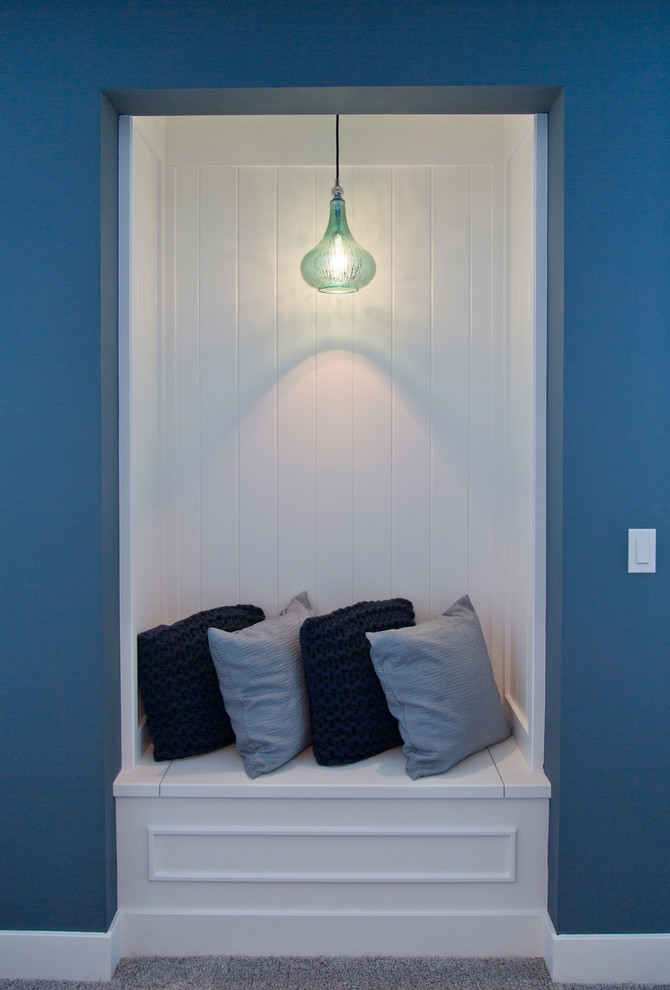 This is an example of a mid-sized transitional guest bedroom in Kansas City with blue walls, carpet and grey floor.