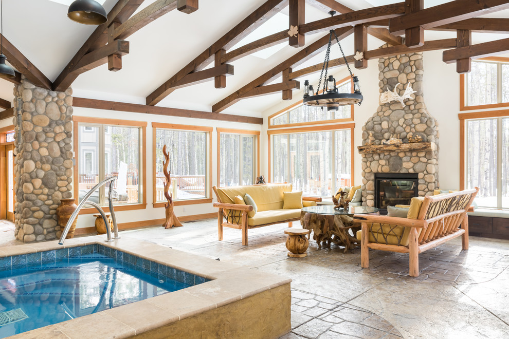 Pool house - mid-sized rustic backyard rectangular lap pool house idea