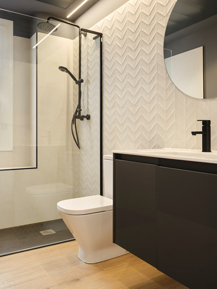 This is an example of a small contemporary 3/4 bathroom in Other with furniture-like cabinets, beige cabinets, a curbless shower, beige tile, ceramic tile, beige walls, medium hardwood floors, a console sink, quartzite benchtops, beige floor, a shower curtain, white benchtops, a single vanity and a floating vanity.