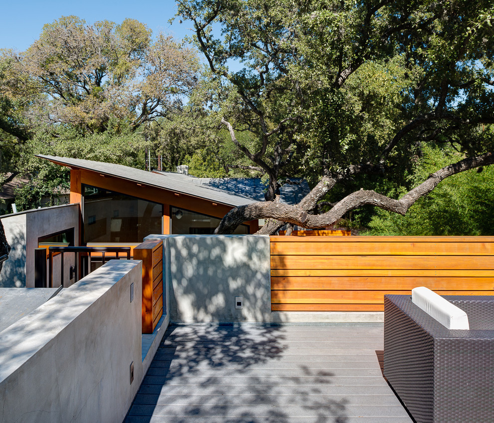 Photo of a small modern backyard deck in Austin.