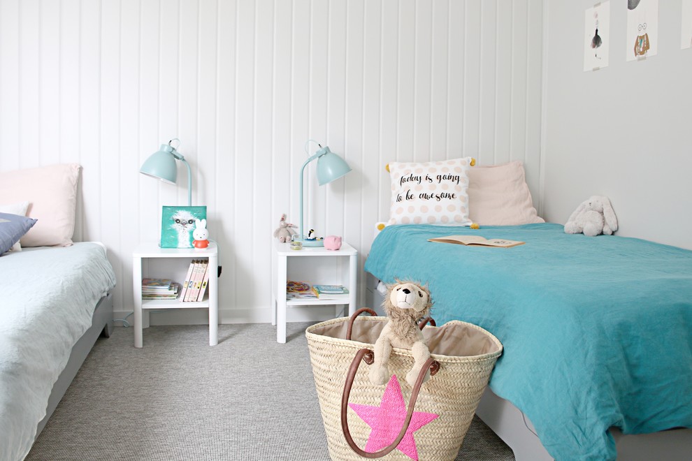 Design ideas for a mid-sized beach style kids' bedroom for kids 4-10 years old and girls in Other with grey walls, cork floors and grey floor.