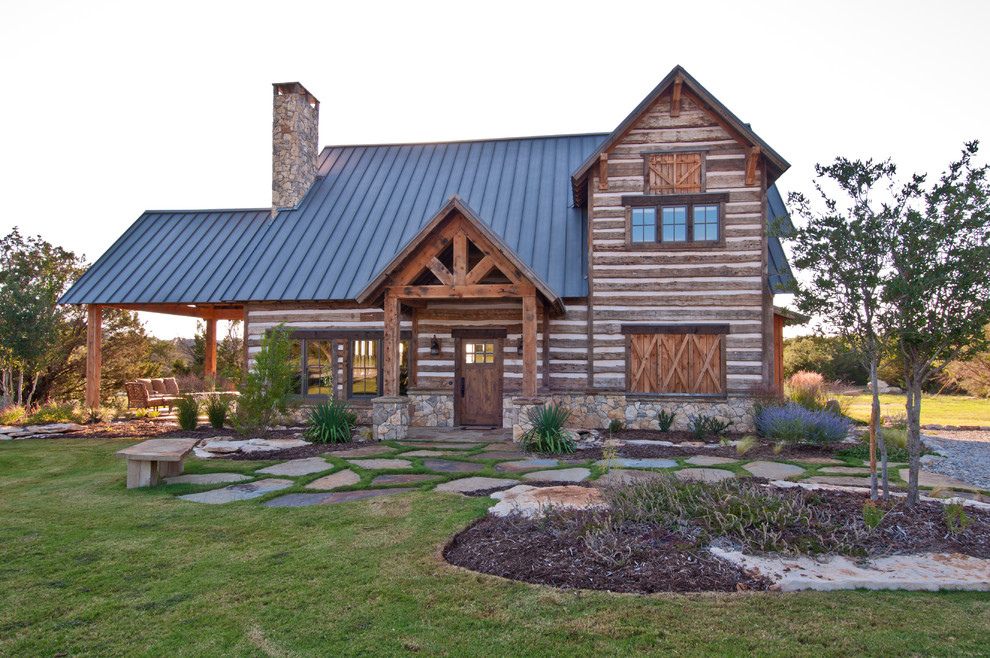 Inspiration for a country exterior in Salt Lake City with wood siding.